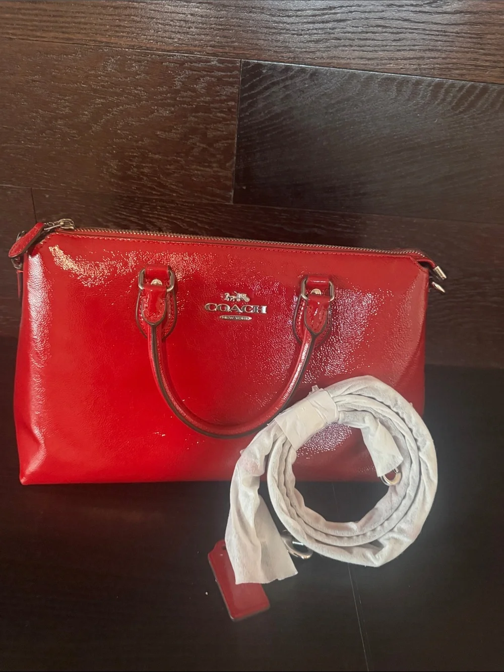 Coach glossy red